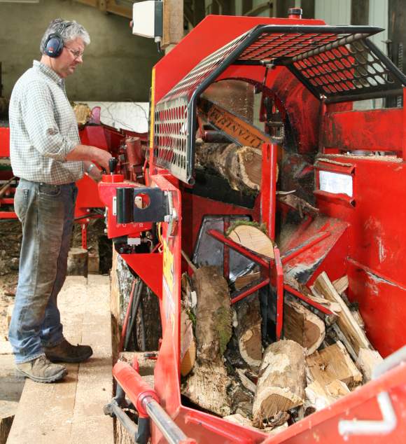 View of the second wood cutting machine during a wood cutting